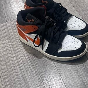 Stylish Black and Orange High-Top Sneakers